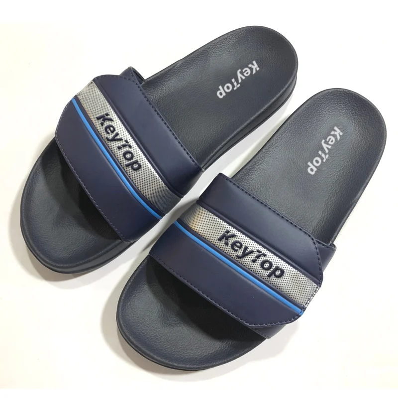 Navy open-back slide reference with a band upper
